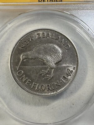 Moneda de plata de 1 florín de Nueva Zelanda 1942 graduada AU 50 detalles limpiada por ANACS Foto 1 de 4