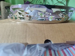 Alessi - SG34 - Ethno Vassoio rotondo con bordo traforato in acciaio - Foto 1 di 6