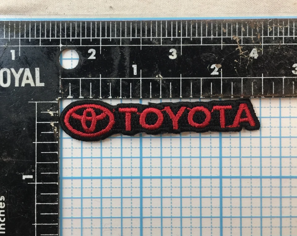VINTAGE TOYOTA LOGO 2.5" IRON ON PATCH - RED ON BLACK - Image 1 of 1