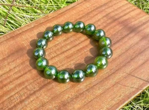 AAAA+ Green Round Bead Star Sapphire Lab-Created Stretch String Beads Bracelet - Picture 1 of 4
