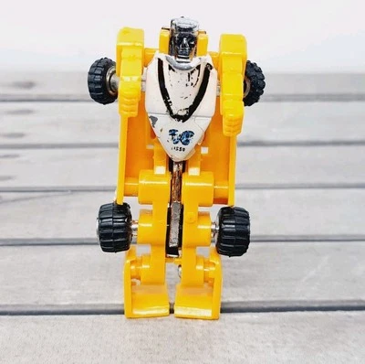 Tonka GoBots SLICKS Action Figure Yellow 1984 Renault Elf Enemy Robot Toy Car — 第 1/4 张图片