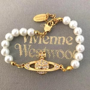 Vivienne Westwood Gold White Pearl Bracelet - Picture 1 of 2