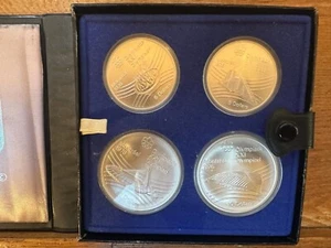 1976 MONTREAL,CANADA OLYMPIC SERIES VII SILVER COIN SET TWO EACH $5 & $10 COINS - Picture 1 of 6