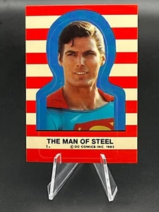 Pegatina Topps DC Comics Superman 1983 #1 Christopher Reeve casi nueva - Imagen 1 de 2
