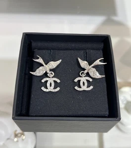 😍CHANEL full crystal inlaid bird shape CCS earrings with silver hardware 24C - Picture 1 of 7
