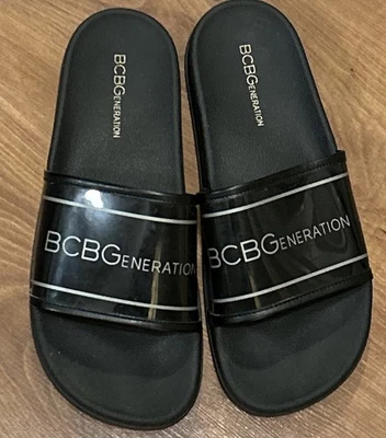 Toboganes para mujer BCBGeneration - negros EE. UU. 8 Foto 1 de 3