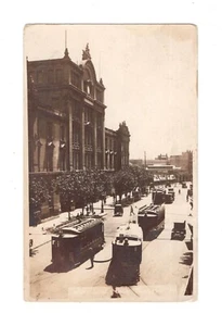 Argentina Buenos Aires postcard calla... tramway advt street scene old auto RPPC - Picture 1 of 2