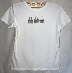 Camisa Vera Bradley Mujer Talla Mediana Blanca Cartera Gráfica Manga Corta Camiseta Usada en Excelente Condición - Imagen 1 de 10