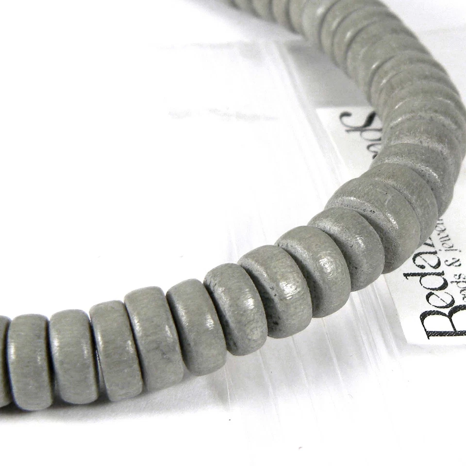 1 filamento de 100 cuentas de madera redondas de 8 mm x 4 mm de grosor con espaciador de rondelle Foto 1 de 1