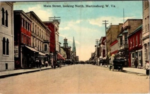 MARTINSBURG, WEST VIRGINIA - BUSY MAIN STREET LOOKING NORTH - OLD POSTCARD - Picture 1 of 2