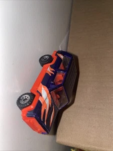 Matchbox Jeep Cherokee 1986  guter Zustand Maßstab 1:56 dunkelblau/pink - Bild 1 von 7