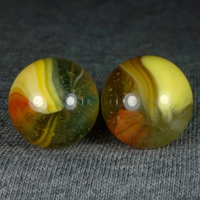 DOS CANICAS ANTIGUAS MAESTRAS "SUNBURST" DE MÁRMOL Foto 1 de 4