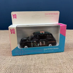 CORGI GREAT BRITISH CLASSICS LONDON TX1 BLACK CAB TAXI 2012 OLYMPIC NEW IN BOX - Picture 1 of 7