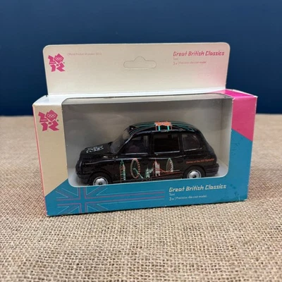 CORGI GREAT BRITISH CLASSICS LONDON TX1 BLACK CAB TAXI 2012 OLYMPIC NEW IN BOX - Image 1 of 4