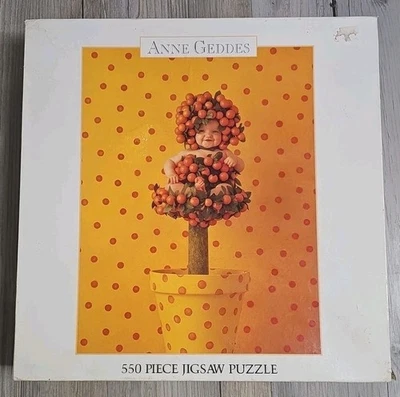 Novo Quebra-cabeça Vintage Ceaco Anne Geddes Orange Tree Baby 550 Peças 1997 24x18 EUA - Imagem 1 de 4
