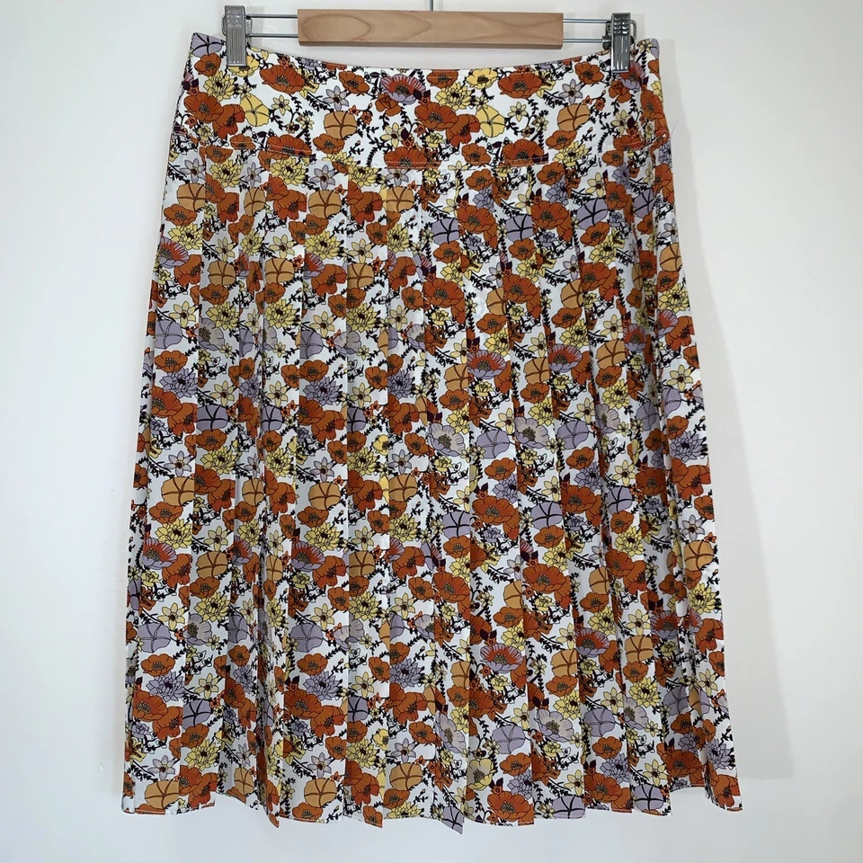 Falda midi plisada de seda Tory Burch para mujer 10 marfil flor ditsy floral diseñador Foto 1 de 4
