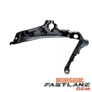 2009-2012 AUDI A4/S4 QUATTRO RIGHT HEADLIGHT MOUNT BRACKET NEW OEM 8K0805608C - Picture 1 of 8