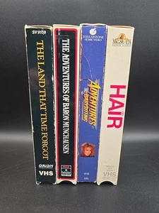 VHS Lot Of 4 - Hair, Baron Munchausen, Adventures Babysitting, Land Time Forgot - Picture 1 of 2
