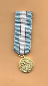MINI MEDALLA DE ORO EXPEDICIÓN ANTÁRTICA ESTADOS UNIDOS - Imagen 1 de 2