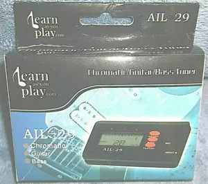 LEARN AS YOU PLAY DIGITAL CHROMATIC GUITAR - BASS TUNER AIL-29 - NEW IN PACKAGE - Picture 1 of 4
