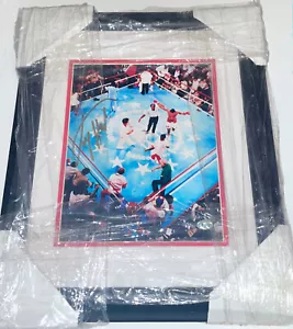 LARRY HOLMES SIGNED 13x16 FRAMED PHOTO DEFEATING MUHAMMAD ALI IN VENEZUELA w/COA - Picture 1 of 3