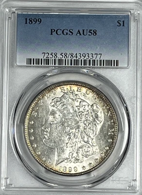1899 Morgan Dollar : PCGS AU58 - Image 1 of 2