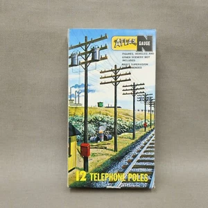 Postes de teléfono calibre N Atlas NOS 12 piezas nuevo stock antiguo plástico marrón - Imagen 1 de 5