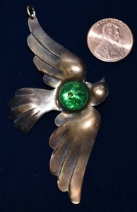 RAW BRASS BIRD SPARROW IN FLIGHT METAL STAMPING PENDANT w/ VINTAGE GREEN GLASS - Picture 1 of 2