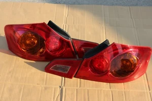 JDM Tail lights TAIL LAMPS INFINITI G37 / NISSAN SKYLINE V36 SET 2007-2011 OEM - Picture 1 of 8