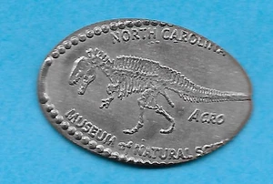 ACRO DINOSAURIO ESQUELETO MUSEO DE CIENCIAS DE Carolina del Norte moneda de diez centavos prensada no centavo retirado - Imagen 1 de 1