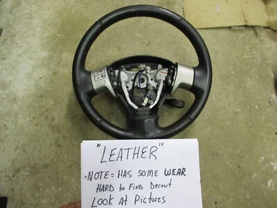 09-13 Volante Toyota Corolla con Audio GRIS OSCURO "CUERO" TIENE ALGO DE DESGASTE Foto 1 de 4