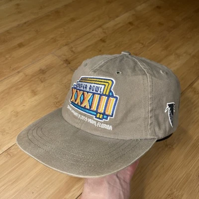 Gorra gorra de colección Logo 7 Super Bowl XXXIII 33 1999 Falcons beige tostado con tirantes BONITA EN MUY BUENA CONDICIÓN Foto 1 de 4