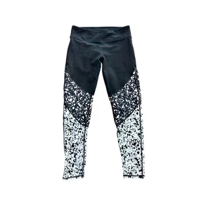 Leggings para mujer Fabletics Brogan Dalmation negros blancos tiro medio atléticos medianos - Imagen 1 de 4