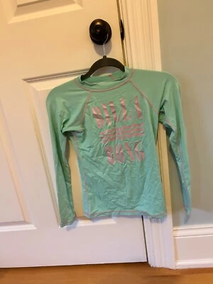 Usada en Excelente Condición Camisa de Sol Billabong Para Mujer - Aqua y Rosa (Talla S) Foto 1 de 3