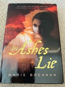 IN ASHES LIE HARDCOVER BOOK BY MARIE BRENNAN - Picture 1 of 1