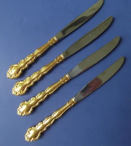 Four Oneida Community "Beethoven" Gold Plated Flatware 9" Dinner Knives - Picture 1 of 2