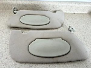 2001-2010 CHRYSLER PT CRUISER SUN VISOR SET DRIVER AND PASSENGER SIDE OEM BEIGE - Picture 1 of 3