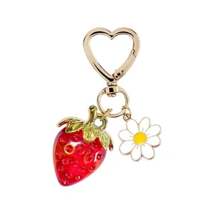 Llavero con dije bolso margarita fresa iridiscente con cierre de corazón de moda 3" - Imagen 1 de 4