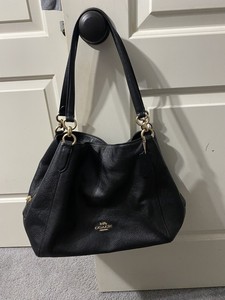 coach black and gold purse