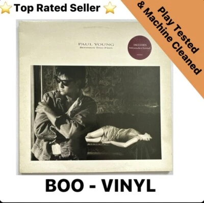 Paul Young - Between Two Fires vinyl Lp Record / album EX / VG+ Con - Image 1 of 4