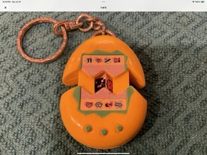 VINTAGE 1997 " YELLOW TAMAGOTCHI " EGG KEY CHAIN TOY F/MCDONALDS F/BANDAI CO. - Picture 1 of 7
