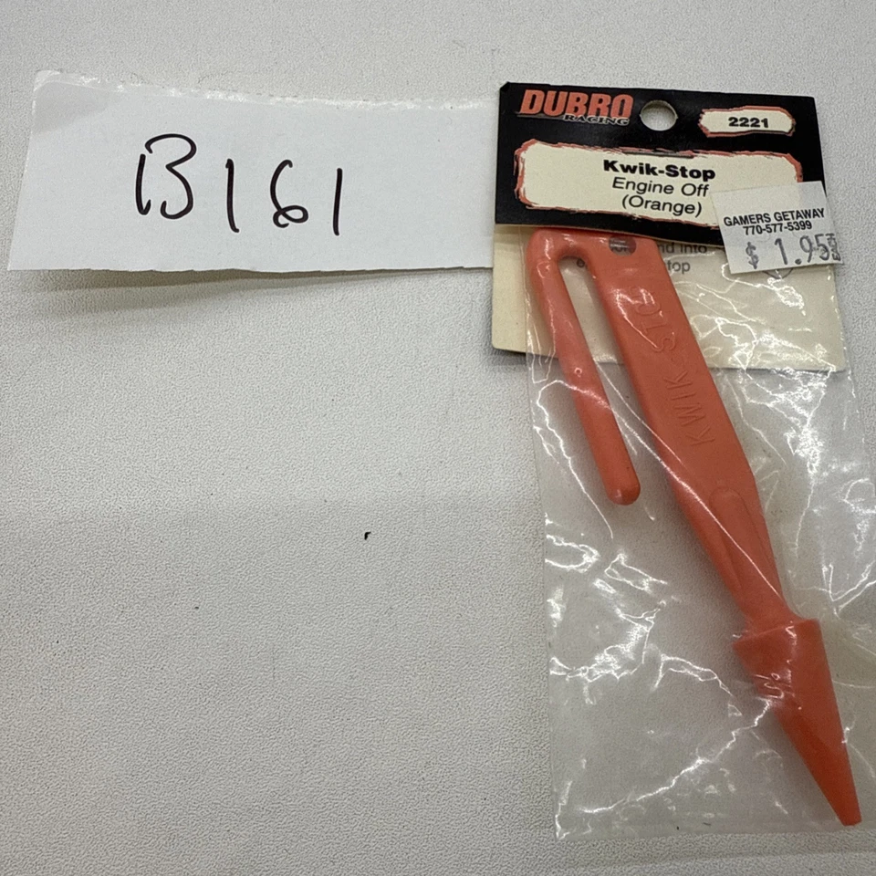 Motor Dubro 2221 Kwik-Stop laranja desligado - Imagem 1 de 1