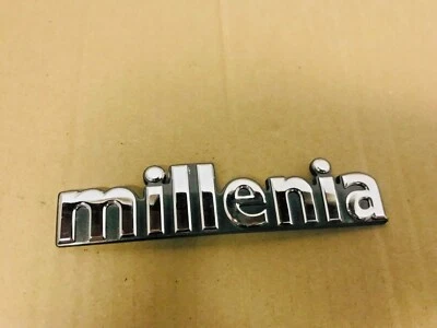 OEM 1999 2000 2001 Mazda Millenia Rear Trunk Badge Logo Emblem T03451721 - Image 1 of 4