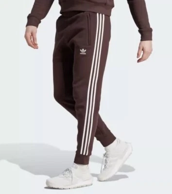 Pantalones Adidas Originales IM2109 Para Hombre 3 Rayas Calce Ajustado Marrón Pierna Cónica Talla Pequeña Foto 1 de 4