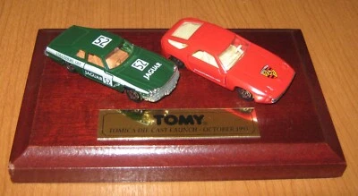 Tomy Tomica Die cast Launch - October 1993 Jaguar & Porsche on plinth - Image 1 of 4