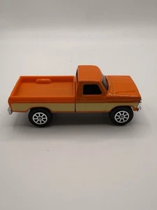 Ford F-150 Pick up Maisto 1977 metallo pressofuso Adventure Force arancione 1:64 sciolto - Foto 1 di 8