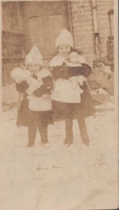 Vintage Photograph - CDV - 2 Girls Dressed Alike Holding Dolls - Snow  4" x 2.5" - Picture 1 of 2