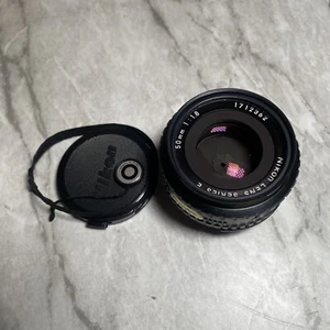 Vintage Nikon Lens Series E 50mm 1:1.8 with caps and Vivitar skylight filter - Picture 1 of 6