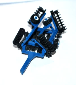 ERTL Diecast 1/64 Scale Blue New Holland Folding Disc Plow. - Picture 1 of 6