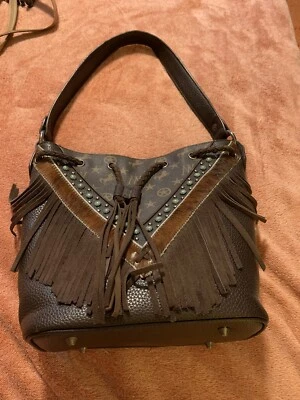 Bolso tipo cubo Montana West con cordón de cuero de vaca con flecos Foto 1 de 4